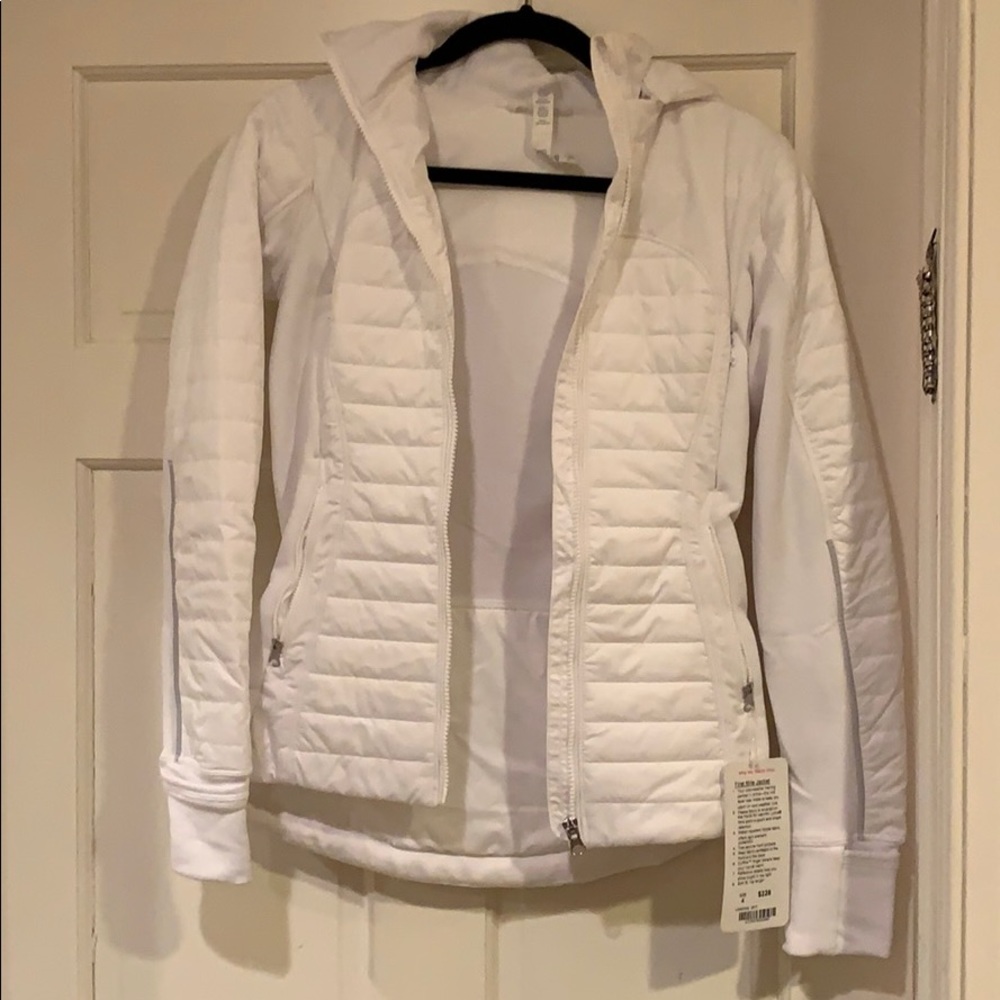 Brand new Lululemon white First Mile Jacket.